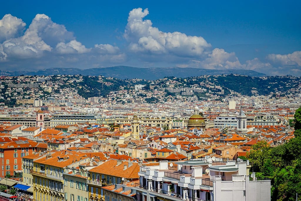 A view of a city from the top of a hill